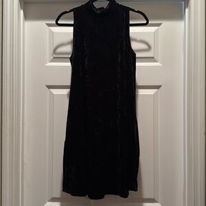NWT Crushed velvet black MTS dress with cut out in back. Sleeveless and a line